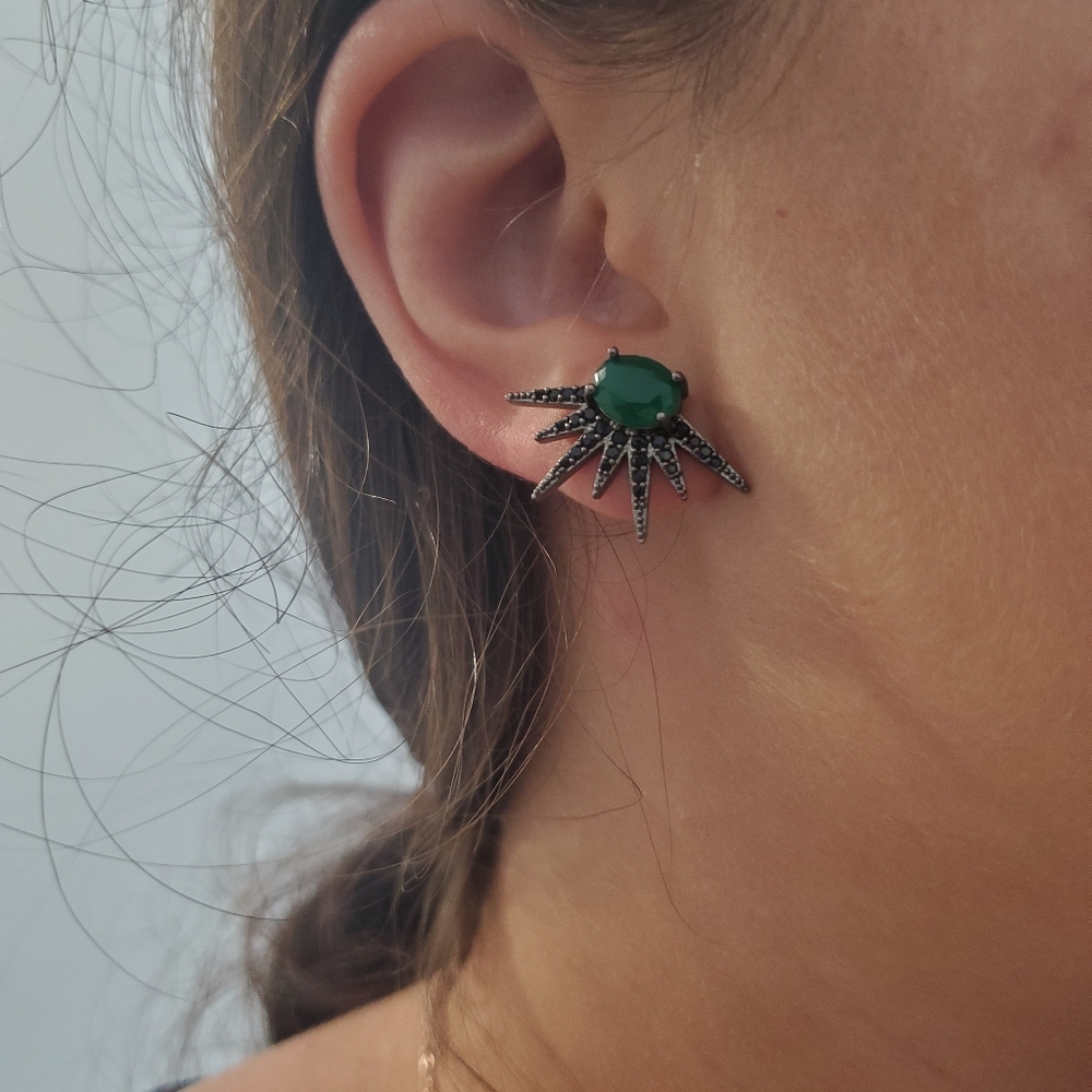 Black and green spike studs